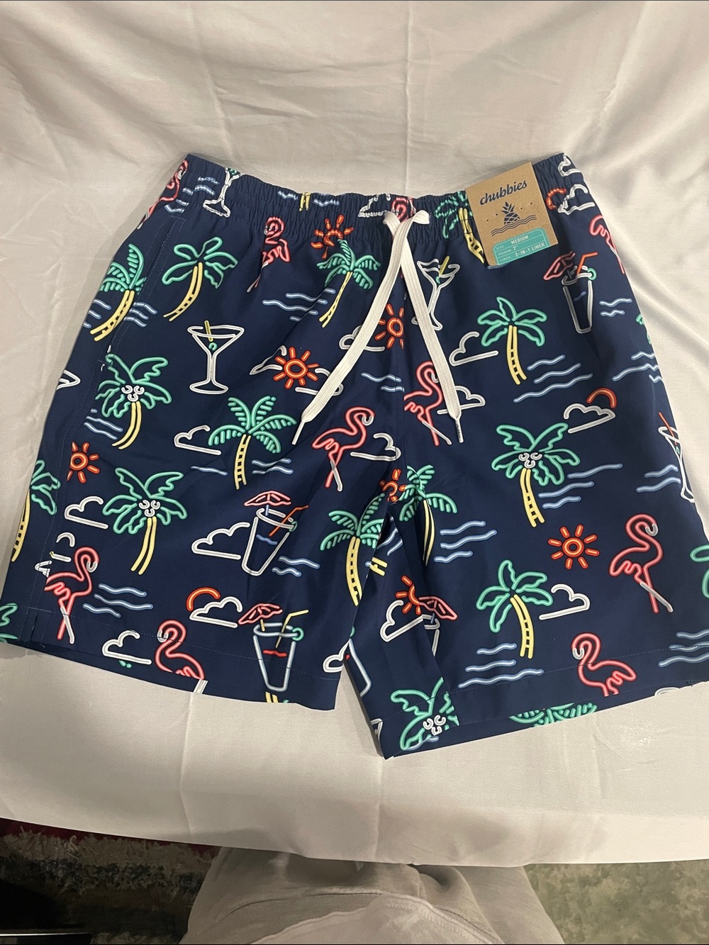chubbies Navy Swim Trunks with Neon Palm Trees, Flamingos & Cocktail Prints